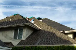 Composite asphalt shingle roof